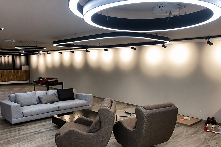 Hotel lounge — track accents combined with cove light (project reference)