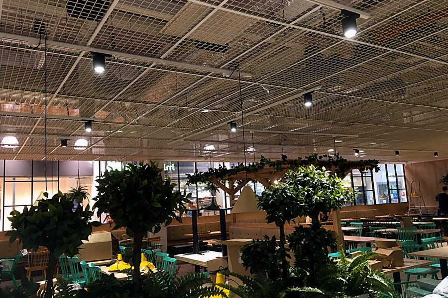 Restaurant — track spots over dining zone and greenery (project reference)