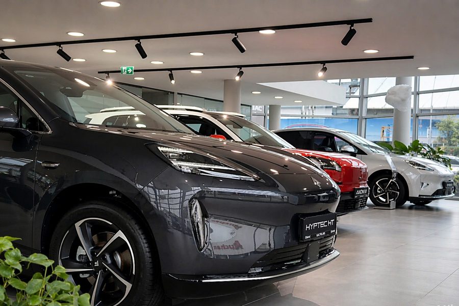 Track lighting installation reference — ceiling track spotlights in a showroom